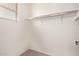 Walk-in closet features neutral carpet and bright natural light at 4428 E Wildhorse Dr, Gilbert, AZ 85297