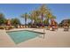 Community spa tub with tables, chairs and palm trees at 4428 E Wildhorse Dr, Gilbert, AZ 85297