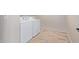 Bright laundry room with washer, dryer, and tile flooring at 4428 E Wildhorse Dr, Gilbert, AZ 85297