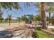 Neighborhood playground with swings, play structure, shade, and a picnic table at 4428 E Wildhorse Dr, Gilbert, AZ 85297