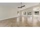 Bright and airy living room with tile floors and ceiling fan at 445 W Gary Ave, Gilbert, AZ 85233