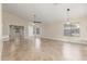 Spacious living room with tile floors, recessed lighting, and ample natural light at 445 W Gary Ave, Gilbert, AZ 85233
