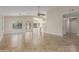 Bright and airy living room with open floor plan and sliding glass doors at 445 W Gary Ave, Gilbert, AZ 85233
