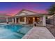 Inviting backyard pool with tiled patio and covered patio areas with beautiful sunset view at 445 W Gary Ave, Gilbert, AZ 85233