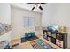 Playful bedroom with colorful decor and soft lighting, perfect for children at 45734 W Sky Ln, Maricopa, AZ 85139