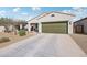 Charming single-story home features a well-maintained yard and an attached two-car garage at 45734 W Sky Ln, Maricopa, AZ 85139