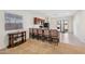 Bright kitchen area with breakfast bar and modern appliances at 45734 W Sky Ln, Maricopa, AZ 85139