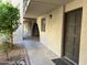 Exterior view of the condo building showcasing the architecture and landscaping at 4727 E Lafayette Blvd # 117, Phoenix, AZ 85018