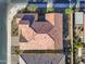 Overhead drone view of a home showcasing its terracotta roof and manicured desert landscaping at 500 E Watermelon Ln, Queen Creek, AZ 85140