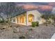 Backyard featuring desert landscaping, gravel, covered patio, and an outdoor living space at 500 E Watermelon Ln, Queen Creek, AZ 85140