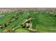 Expansive golf course view showcasing lush green fairways, mature trees, and scenic landscaping at 500 E Watermelon Ln, Queen Creek, AZ 85140