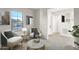 Bright sitting area with neutral walls, large window and stylish decor throughout at 500 E Watermelon Ln, Queen Creek, AZ 85140