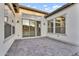 This spacious patio features tiled flooring, a covered area, and large windows at 500 E Watermelon Ln, Queen Creek, AZ 85140