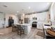 Spacious kitchen featuring a large island, stainless steel appliances, and ample storage in stylish white cabinets at 5140 E Desert Forest Trl, Cave Creek, AZ 85331