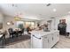 Bright open floor plan with kitchen island, dining area, and living room provides ample living space and an airy feel at 5140 E Desert Forest Trl, Cave Creek, AZ 85331