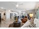 Open-concept living room showcases modern design and seamless flow into a bright and functional kitchen area at 5140 E Desert Forest Trl, Cave Creek, AZ 85331