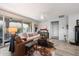 Comfortable living room with stylish furnishings, a cozy atmosphere, and seamless access to an outdoor patio area at 5140 E Desert Forest Trl, Cave Creek, AZ 85331