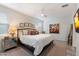 Bright main bedroom featuring a ceiling fan, natural light, and a calming color palette at 5140 E Desert Forest Trl, Cave Creek, AZ 85331