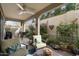 Beautiful covered patio with comfortable seating area and outdoor space for relaxation and entertaining at 5140 E Desert Forest Trl, Cave Creek, AZ 85331