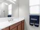 Clean bathroom with a large mirror, vanity, and neutral color scheme offering a refreshing space at 6208 E Lonesome Trl, Cave Creek, AZ 85331