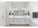 Double vanity bathroom featuring modern fixtures and natural light at 6208 E Lonesome Trl, Cave Creek, AZ 85331