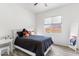 Cozy bedroom with a window view and comfortable furnishings at 6208 E Lonesome Trl, Cave Creek, AZ 85331