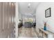Inviting foyer leading into a bright living space with wood-look tile floors at 6208 E Lonesome Trl, Cave Creek, AZ 85331