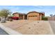 Stunning home featuring desert landscaping, an inviting drive, and a beautiful exterior elevation at 6208 E Lonesome Trl, Cave Creek, AZ 85331