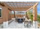 Relaxing hot tub area with a wooden pergola, a tranquil backyard retreat at 6208 E Lonesome Trl, Cave Creek, AZ 85331