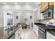 Well-equipped kitchen overlooking the dining area, featuring modern appliances at 6208 E Lonesome Trl, Cave Creek, AZ 85331