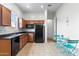 Efficient kitchen with essential appliances and cabinet space, paired with a casual dining area, ideal for quick meals at 6208 E Lonesome Trl, Cave Creek, AZ 85331