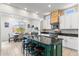 Bright and airy kitchen with a central island, white cabinetry, and modern finishes at 6208 E Lonesome Trl, Cave Creek, AZ 85331