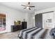 Bedroom featuring a barn door to the bathroom and a backyard view at 6208 E Lonesome Trl, Cave Creek, AZ 85331
