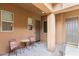 Cozy front patio with seating, offering a welcoming outdoor space to relax and enjoy the surroundings at 6208 E Lonesome Trl, Cave Creek, AZ 85331