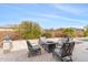 Cozy patio with comfortable seating surrounding a fire pit, ideal for outdoor enjoyment at 6208 E Lonesome Trl, Cave Creek, AZ 85331