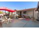 Spacious patio with seating area and BBQ, perfect for outdoor entertaining at 6646 E Dodge St, Mesa, AZ 85205