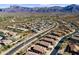This community is nestled within a picturesque desert landscape, featuring homes with tile roofs and lush landscaping at 8117 E Sweet Bush Ln, Gold Canyon, AZ 85118