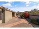 Desert landscaped backyard with mature plants, gravel, water feature, and views of the beautiful Arizona mountains at 8117 E Sweet Bush Ln, Gold Canyon, AZ 85118