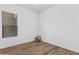Bedroom features natural light, wood-look floors, and neutral walls at 8117 E Sweet Bush Ln, Gold Canyon, AZ 85118