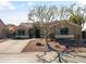 Charming single-story home featuring desert landscaping and a tile roof at 8117 E Sweet Bush Ln, Gold Canyon, AZ 85118