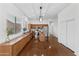 Well-appointed kitchen featuring stainless steel appliances, an island, ample cabinet space, and hardwood floors at 8117 E Sweet Bush Ln, Gold Canyon, AZ 85118