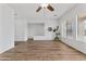 Spacious living room with hardwood floors, recessed lighting, and ample natural light, creating an inviting atmosphere at 8117 E Sweet Bush Ln, Gold Canyon, AZ 85118