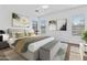 Relaxing main bedroom with natural light, neutral decor, and a comfortable seating area at 8117 E Sweet Bush Ln, Gold Canyon, AZ 85118