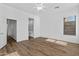Bedroom featuring hardwood floors, recessed lighting, and an ensuite bathroom for added convenience and privacy at 8117 E Sweet Bush Ln, Gold Canyon, AZ 85118