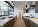 State-of-the-art kitchen with stainless steel appliances, a long island and seamless flow to dining area at 8510 S 9Th Dr # 20, Phoenix, AZ 85041