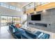 Bright, open living room with a stone accent wall, fireplace and clerestory windows at 8510 S 9Th Dr # 20, Phoenix, AZ 85041
