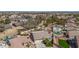 Extensive aerial view of neighborhood with houses, trees, and community areas at 8554 W Keim Dr, Glendale, AZ 85305
