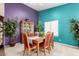Inviting dining area with a large table, nice chairs, and plenty of room for entertaining at 8554 W Keim Dr, Glendale, AZ 85305