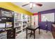 Well-organized office features ample storage, a functional desk, and colorful accent walls at 8554 W Keim Dr, Glendale, AZ 85305