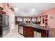 Bright and airy kitchen featuring stainless steel appliances, granite countertops, and an open layout at 8554 W Keim Dr, Glendale, AZ 85305